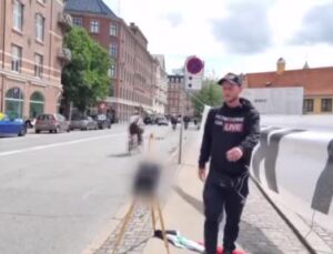 Danimarka’da Kur’an-ı Kerim’in yakılmasını önlemeye çalışan kadına polisten sert müdahale