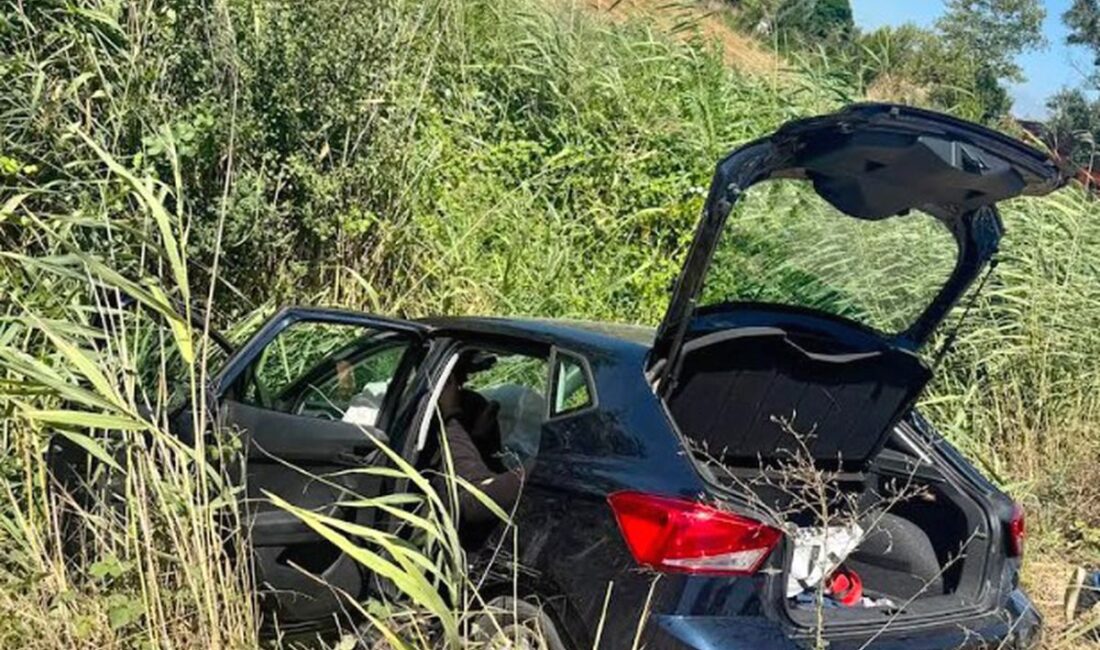 Karacabey'de otomobil sulama kanalına devrildi. Olay yerinde güvenlik önlemleri alındı,