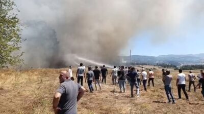 Orhaneli'de çıkan anız yangını kontrol altına alınmış olup, yetkililer olayla